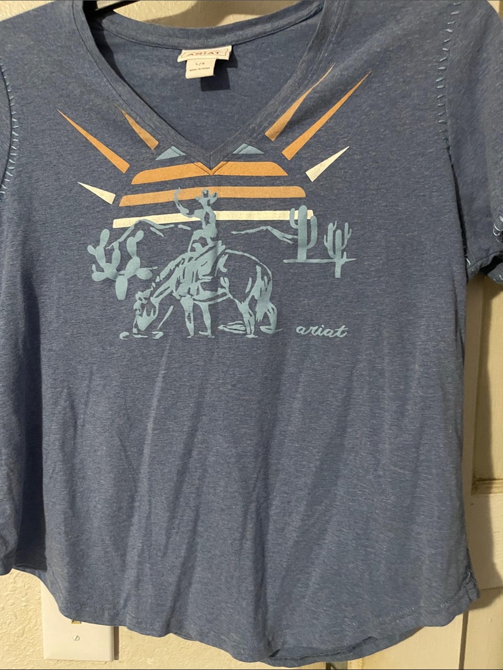 Women’s Ariat Blue V-Neck Desert Graphic Tee with Orange Accents